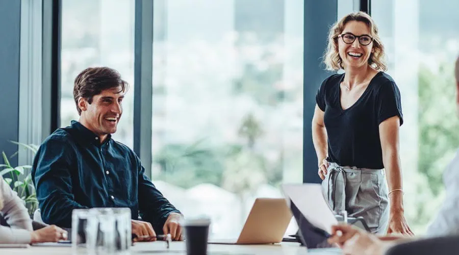 Team leader engaging  with the team during a  meeting