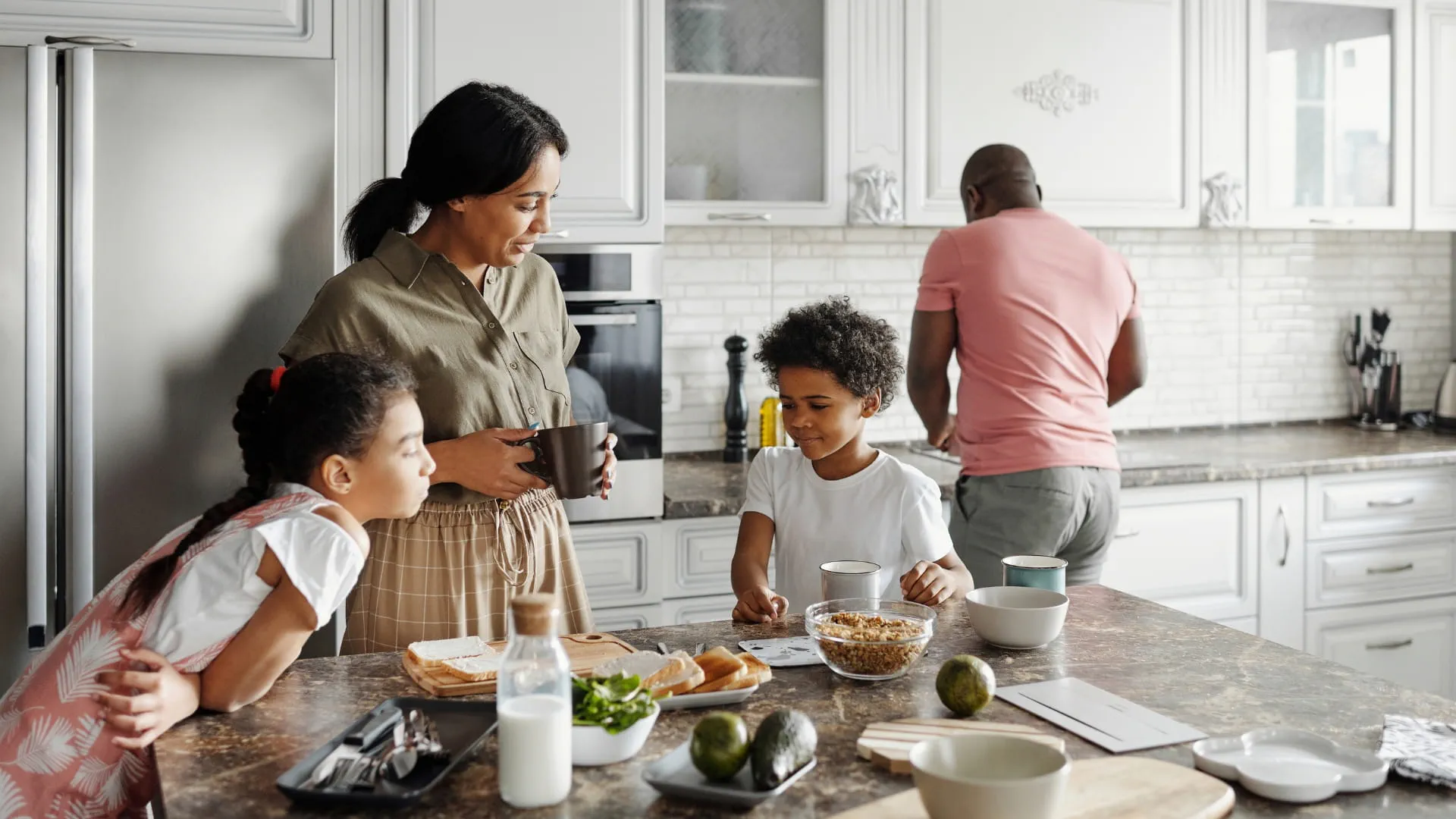 family spending quality time in the kitchen family spending quality time in the kitchen