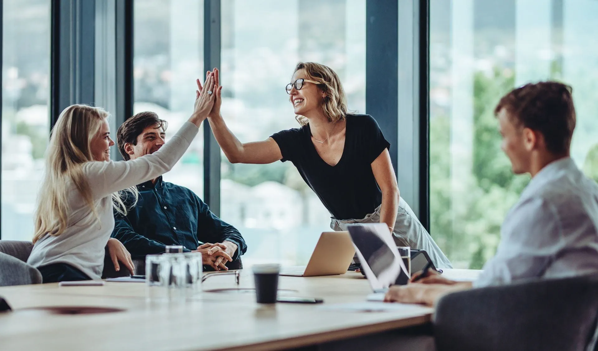 team in the office is celebrating the successful completion of a project. The atmosphere is cheerful and enthusiastic. team in the office is celebrating the successful completion of a project. The atmosphere is cheerful and enthusiastic.