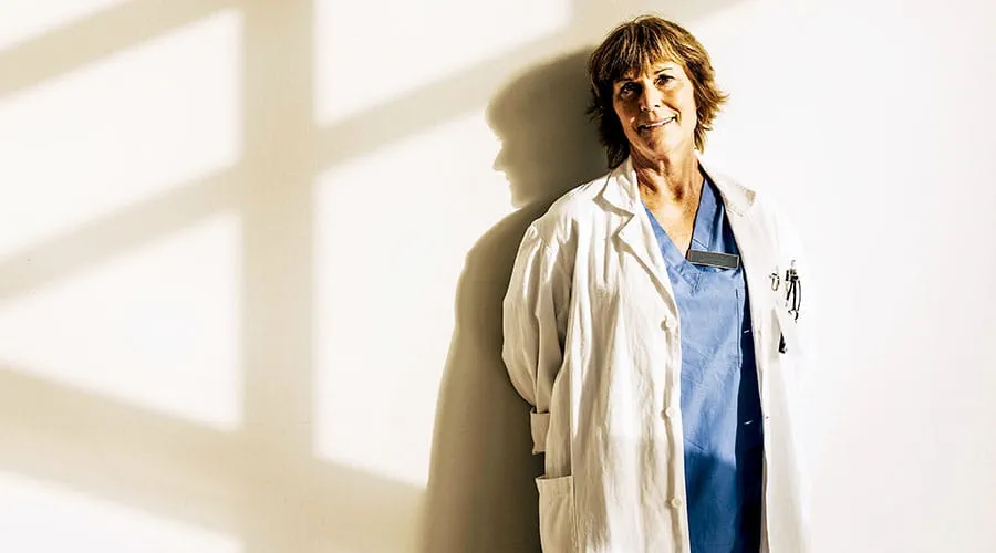 Person standing in modern healthcare building