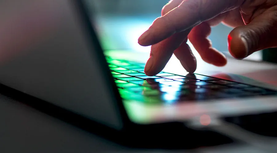 Close up of hands typing on keyboard Close up of hands typing on keyboard