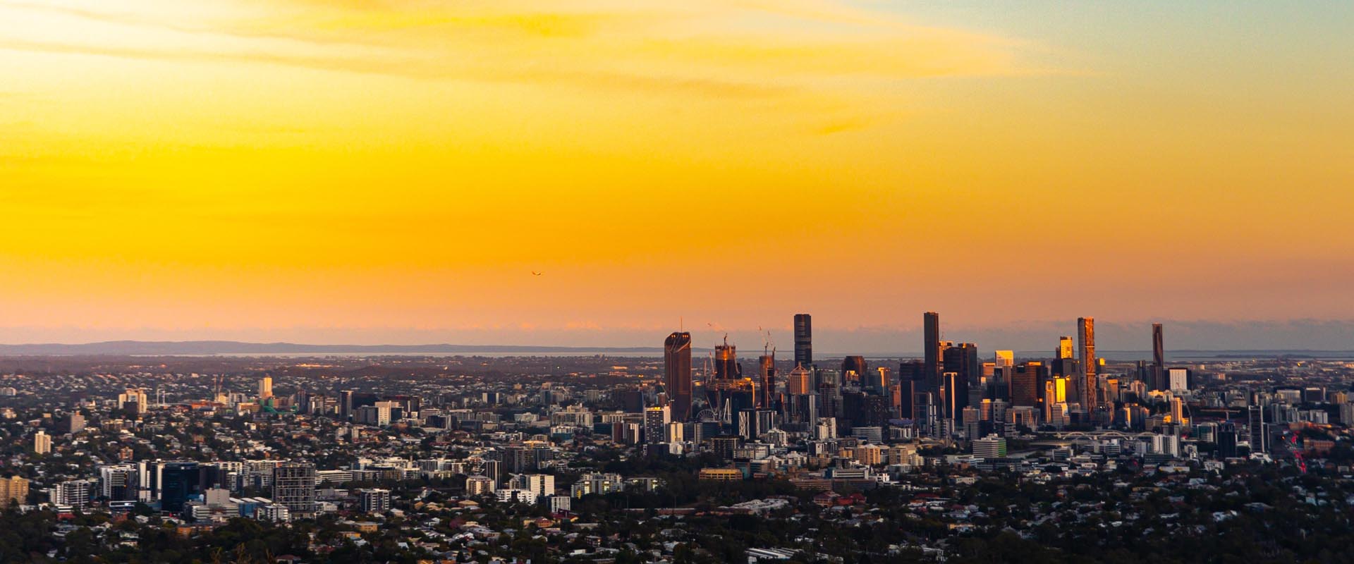 Panoramic view of Brisbane skyline at sunset