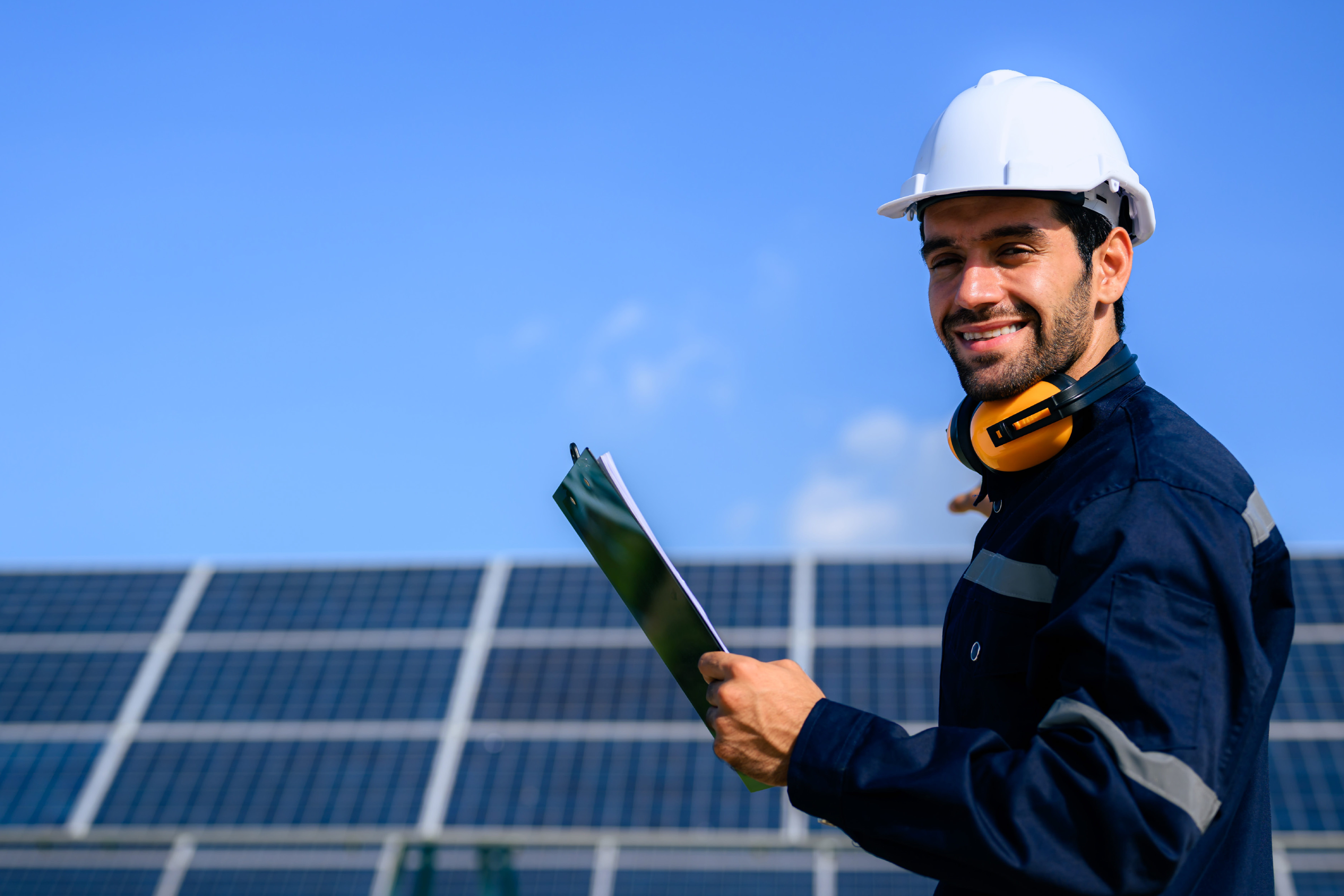 male-engineer-in-front-solar-panels