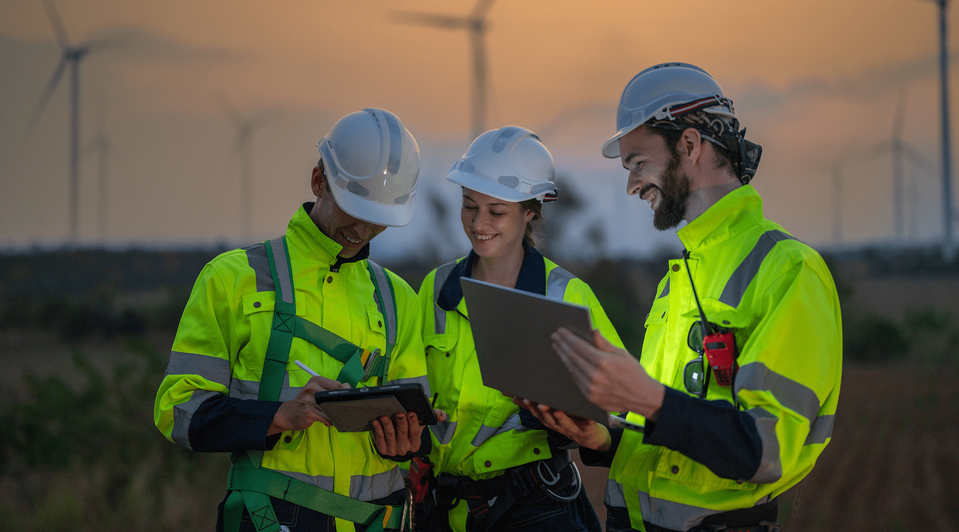 3-renewable-energy-engineers-near-windturbines