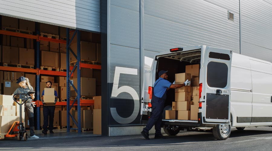 Retail warehouse with logistics staff handling inventory