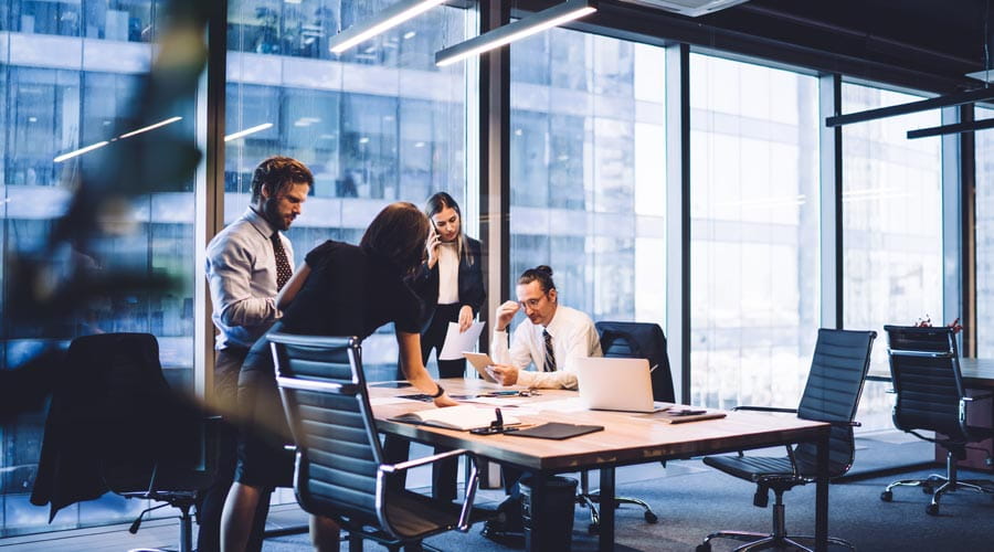 Business team preparing for a board meeting in a modern office