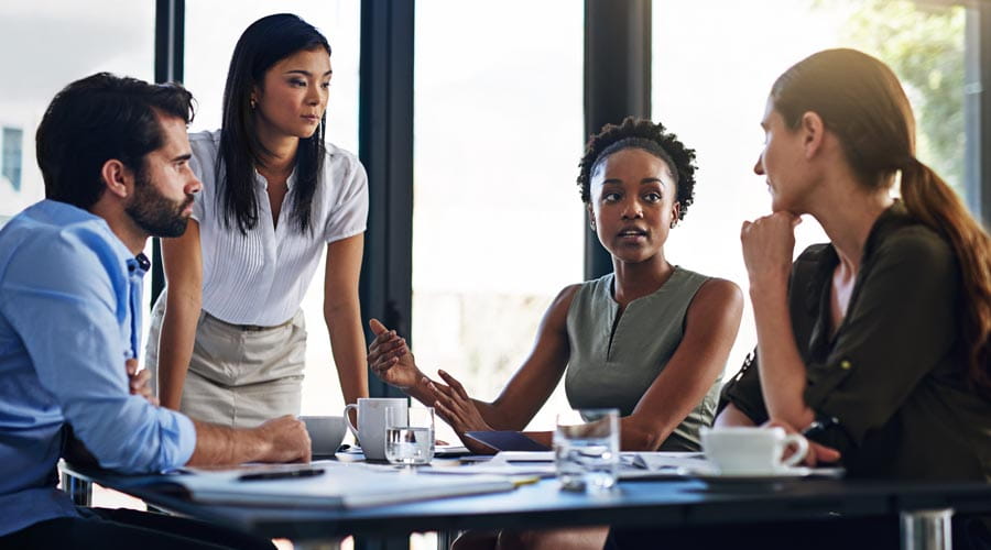 Female team leader guiding a business meeting in an office