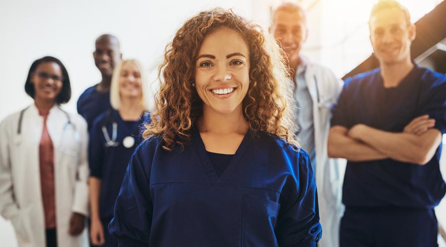 Happy female medical  professional in a  healthcare setting