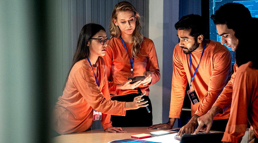 Team collaborating around table in office