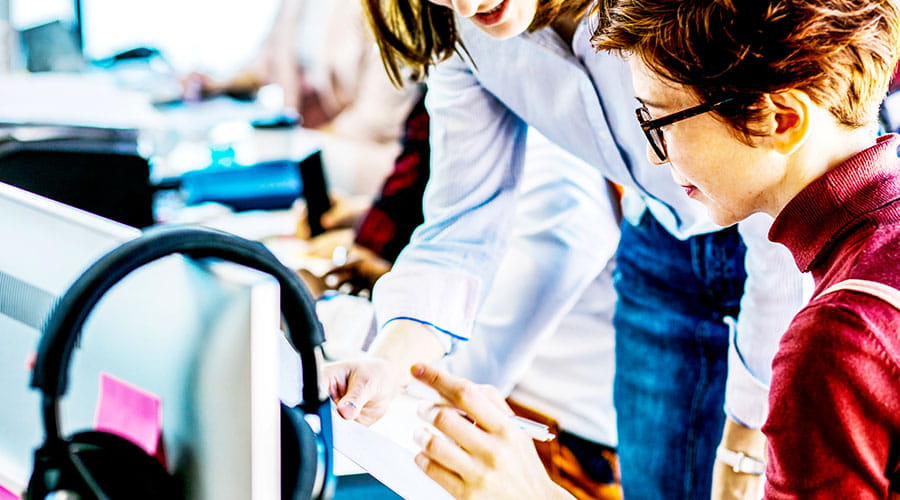 People collaborating in modern workspace