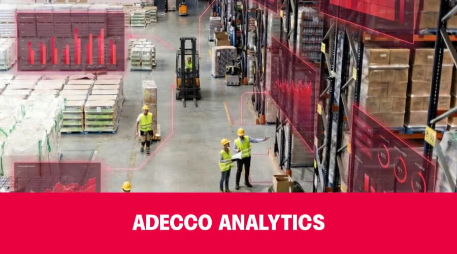 Warehouse aisle with red banner reading ADECCO ANALYTICS. Warehouse aisle with red banner reading ADECCO ANALYTICS.