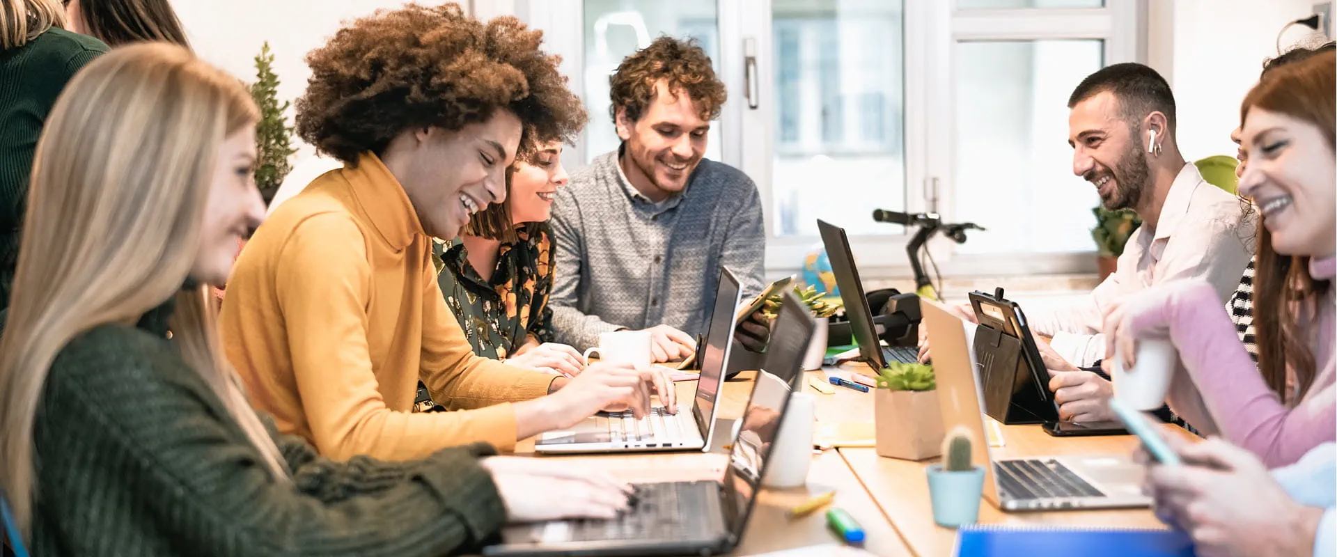 Young people in co-working creative space. Young people in co-working creative space.