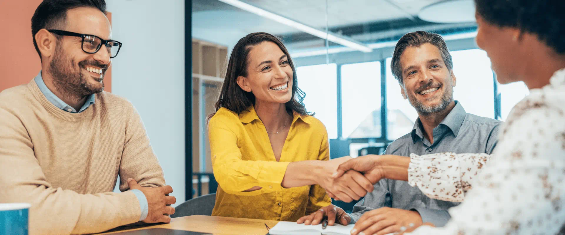 Three interviewers talk to a job candidate Three interviewers talk to a job candidate