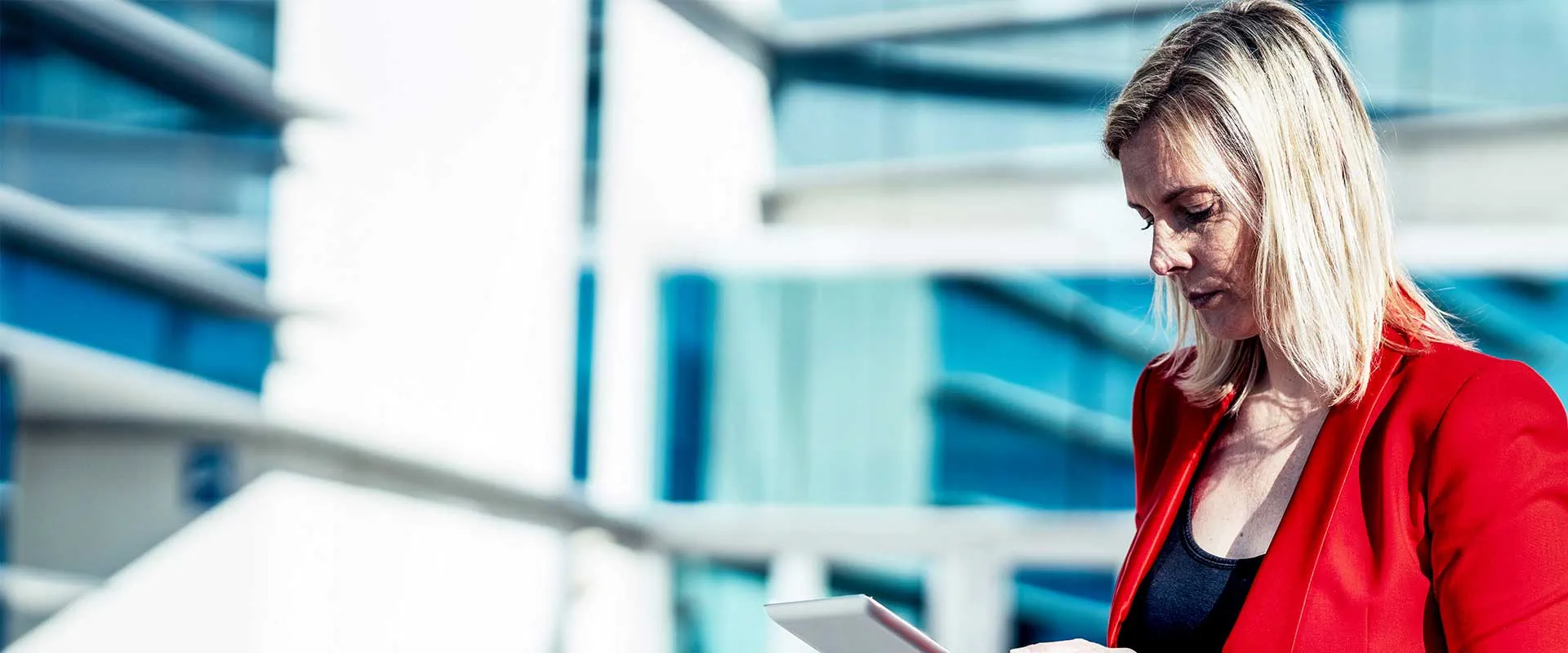  Professional reviewing plans in modern building environment
