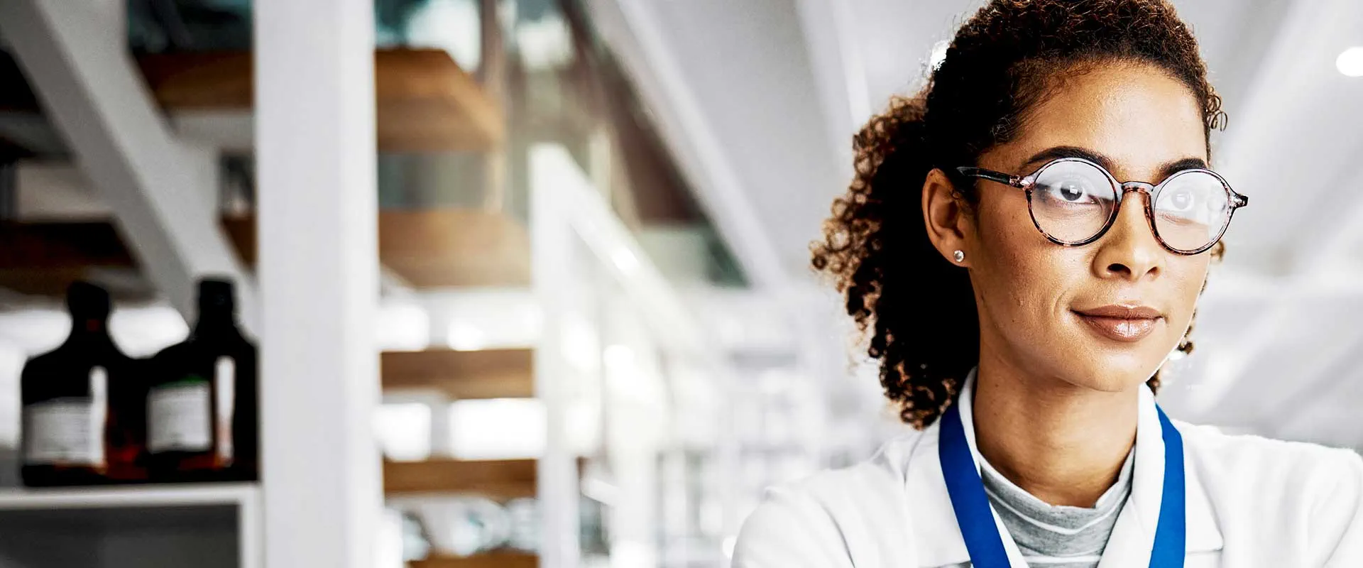 Healthcare professional standing in laboratory environment Healthcare professional standing in laboratory environment