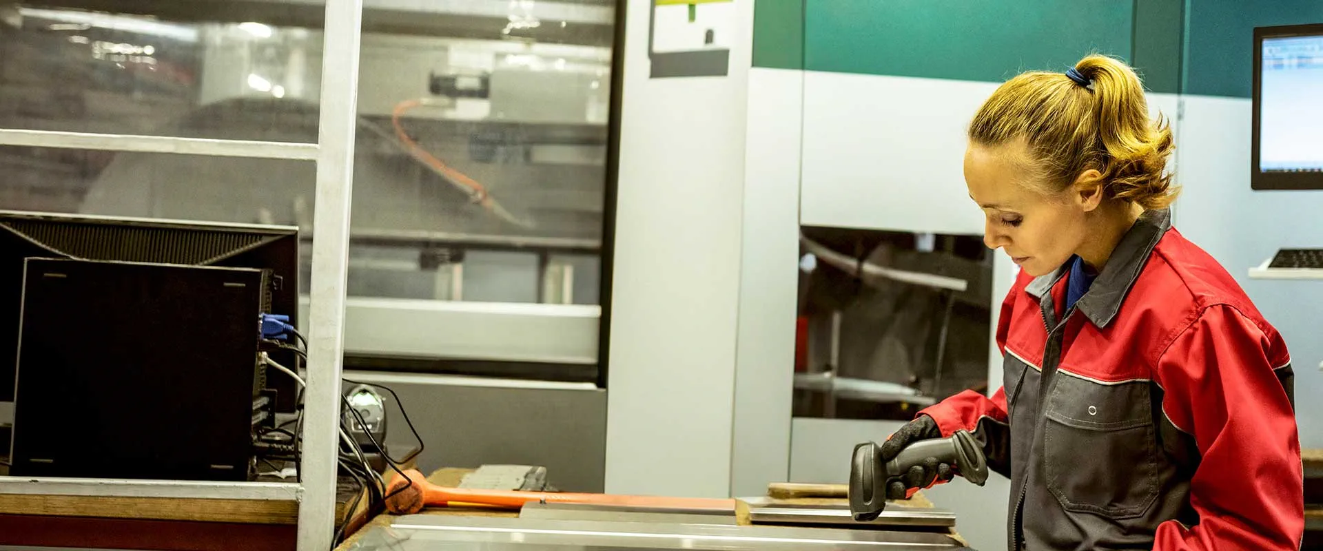  Technician assembling components on production line