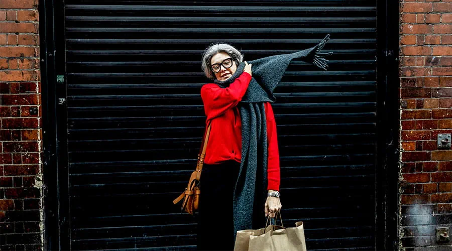  Person standing outside shop entrance