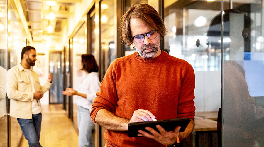  Person using tablet in office environment